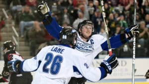 Chad Demers celebrates on the ice with Tanner Lane