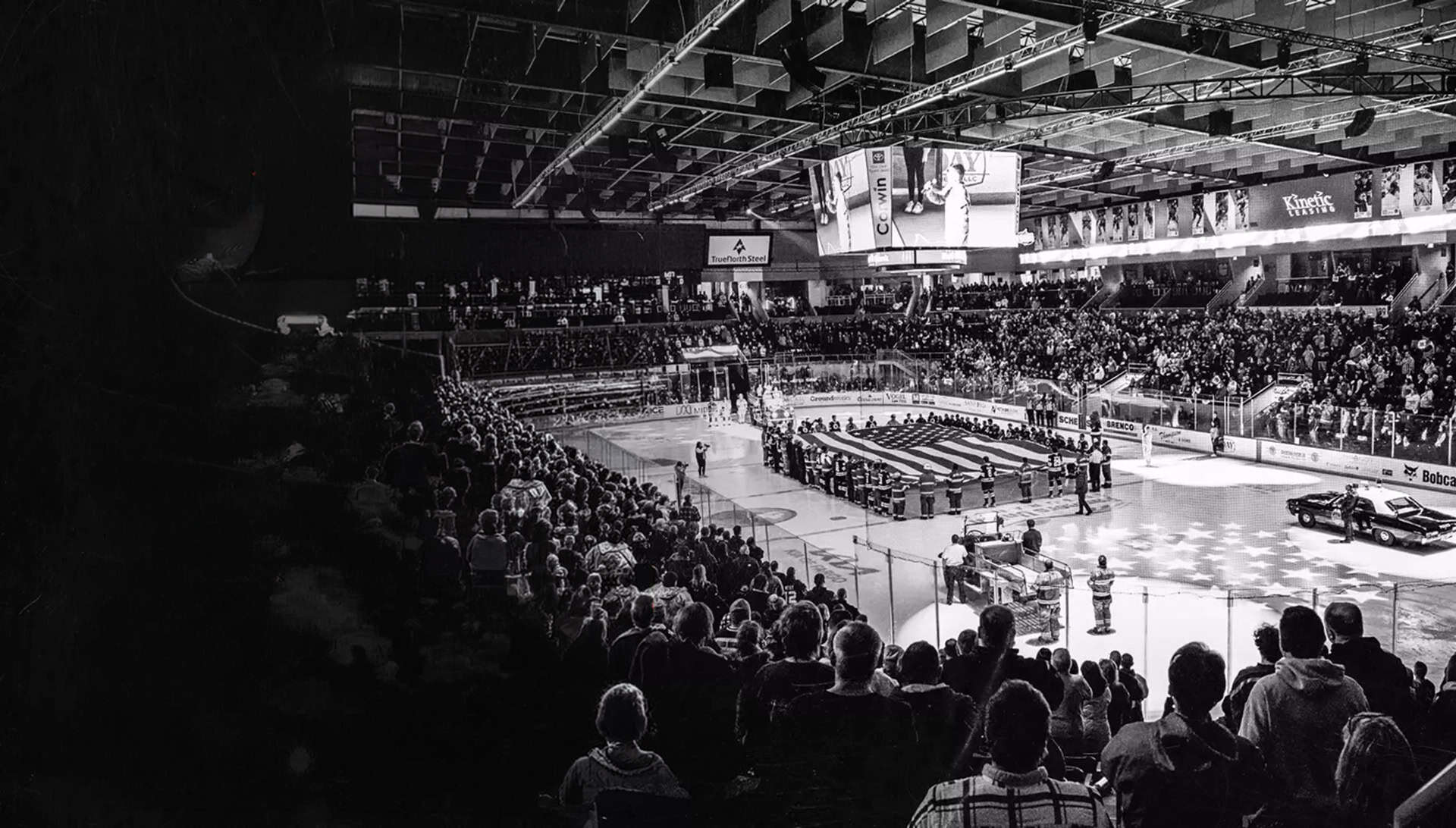 black and white photo of Scheels arena on Hometown Heroes Night 2026